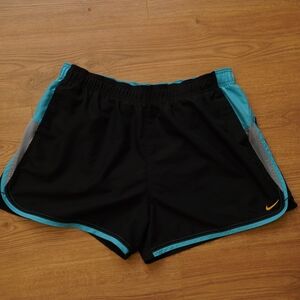 Nike Black Athletic Shorts with Teal Trim and Orange Swoosh